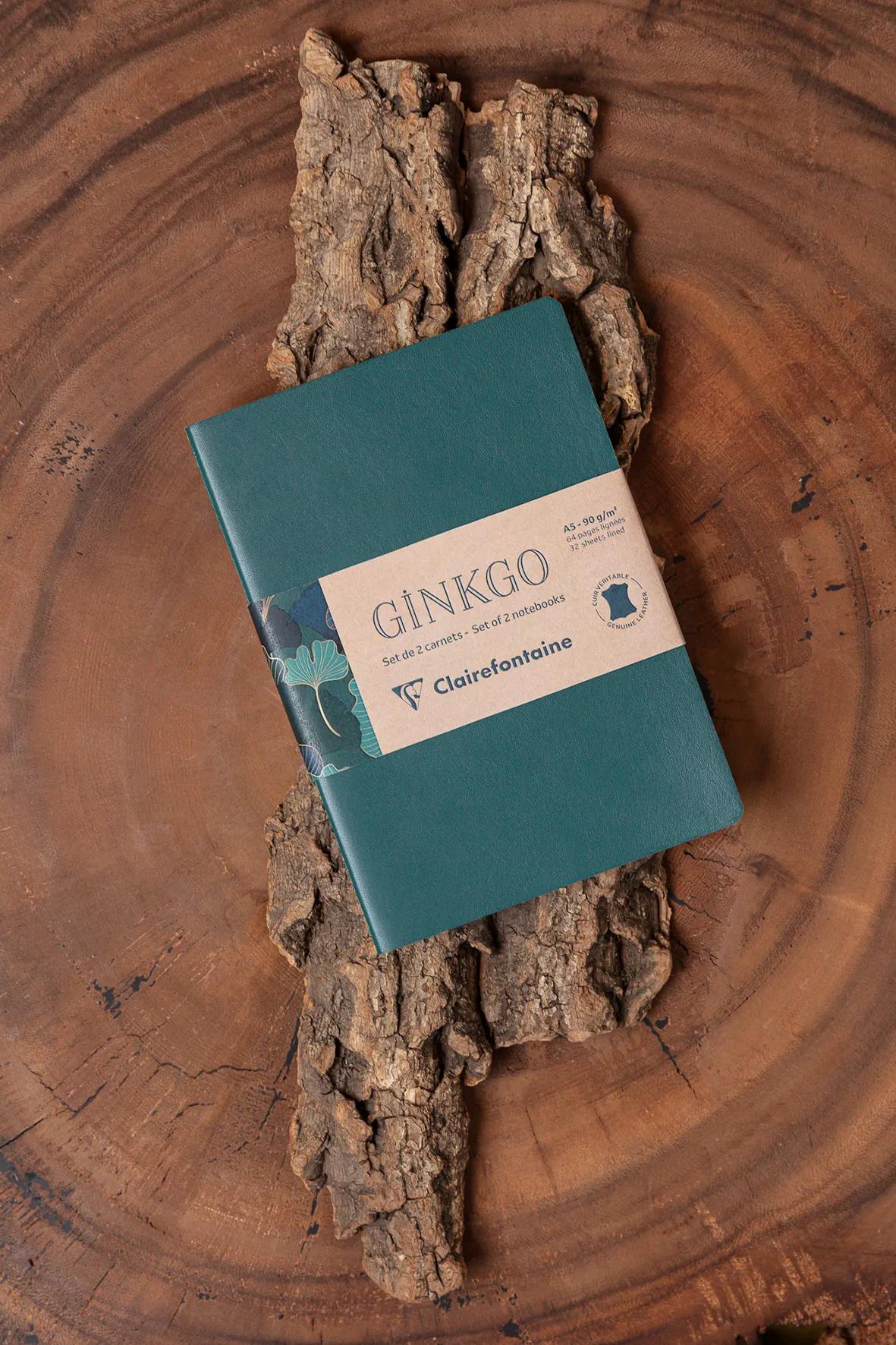 Ginkgo, Set of 2 notebooks sewn wire A5 14,8x21 cm, 64 pages, lineed. 1 leather cover book + 1 card cover card printed, ass.