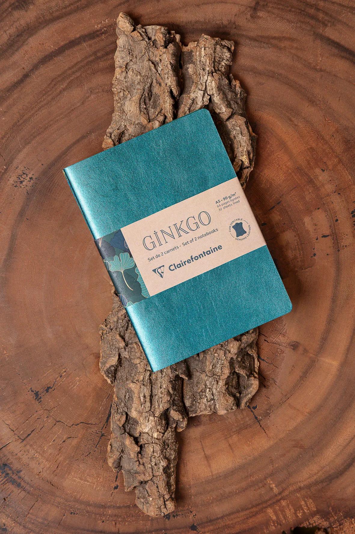 Ginkgo, Set of 2 notebooks sewn wire A5 14,8x21 cm, 64 pages, lineed. 1 leather cover book + 1 card cover card printed, ass.