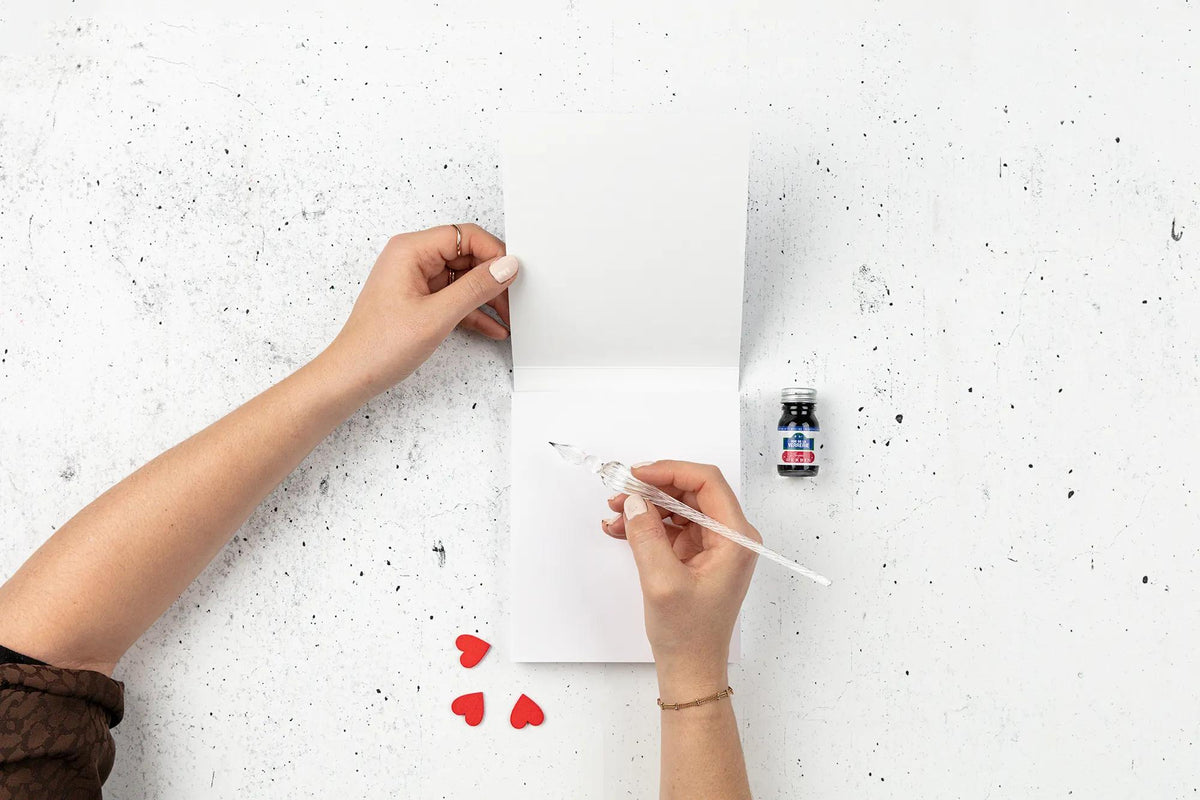 The Wall of I love you, Calligraphy set 21x21 cm containing a glass feather, a bottle of ink Rue de la Verrerie 10ml Jacques Herbin, a block of 60 sheets of white paper 185g - New